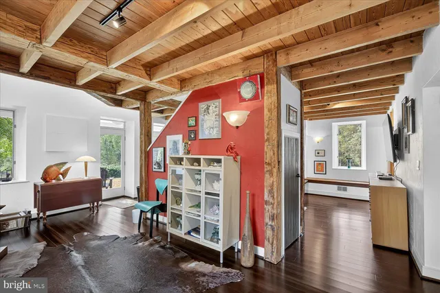 a kitchen with stainless steel appliances granite countertop a refrigerator and a stove