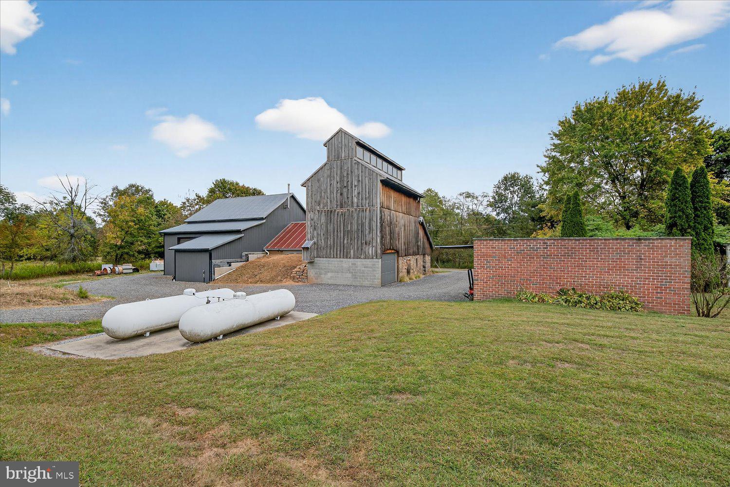 464 Locust Lane Littlestown, PA 17340 - Photo 65 of 81 a backyard of a house with table and chairs