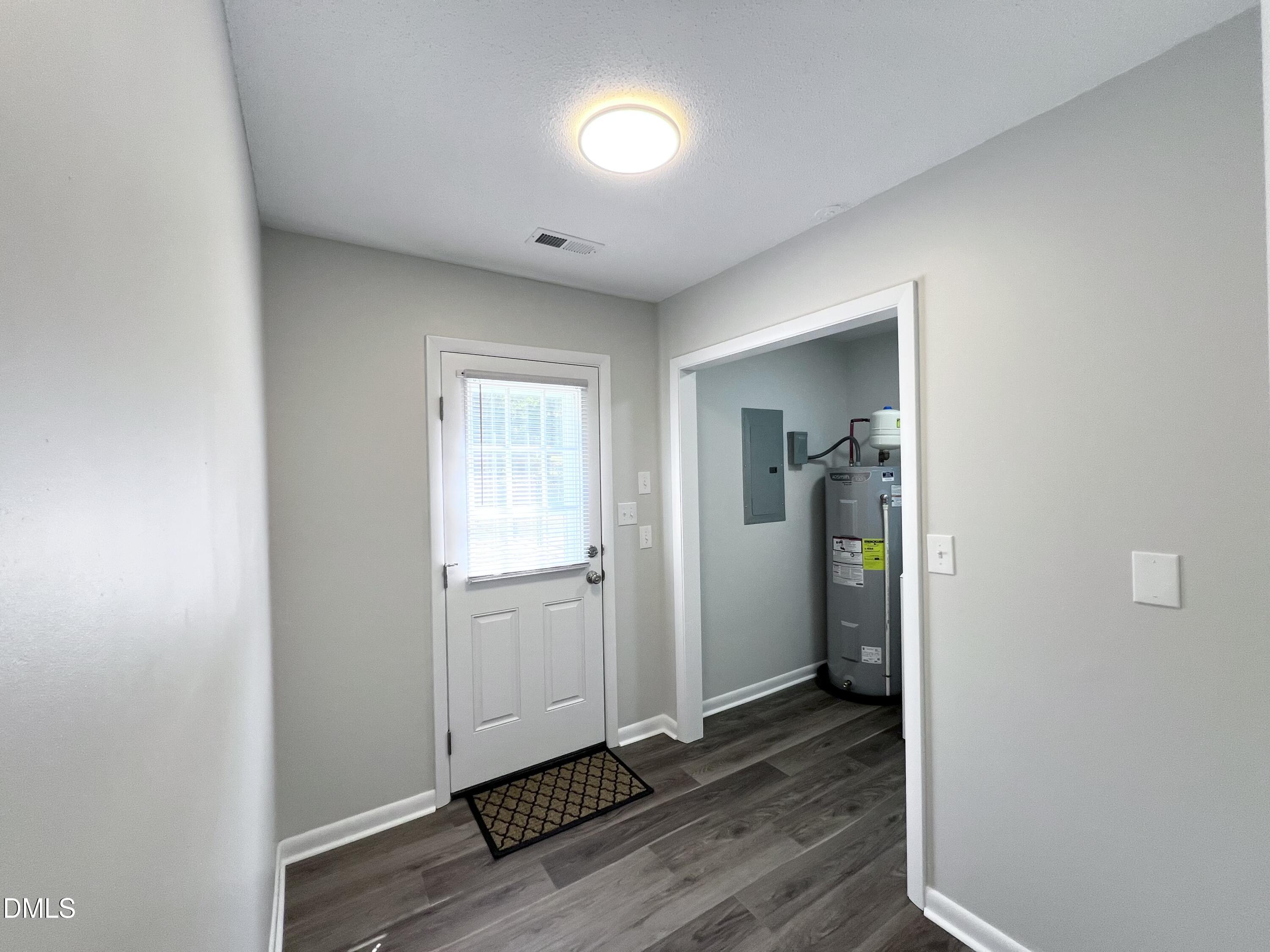 200 Infinity Road Durham, NC 27712 - Photo 12 of 32 a view of a room with wooden floor and bathroom