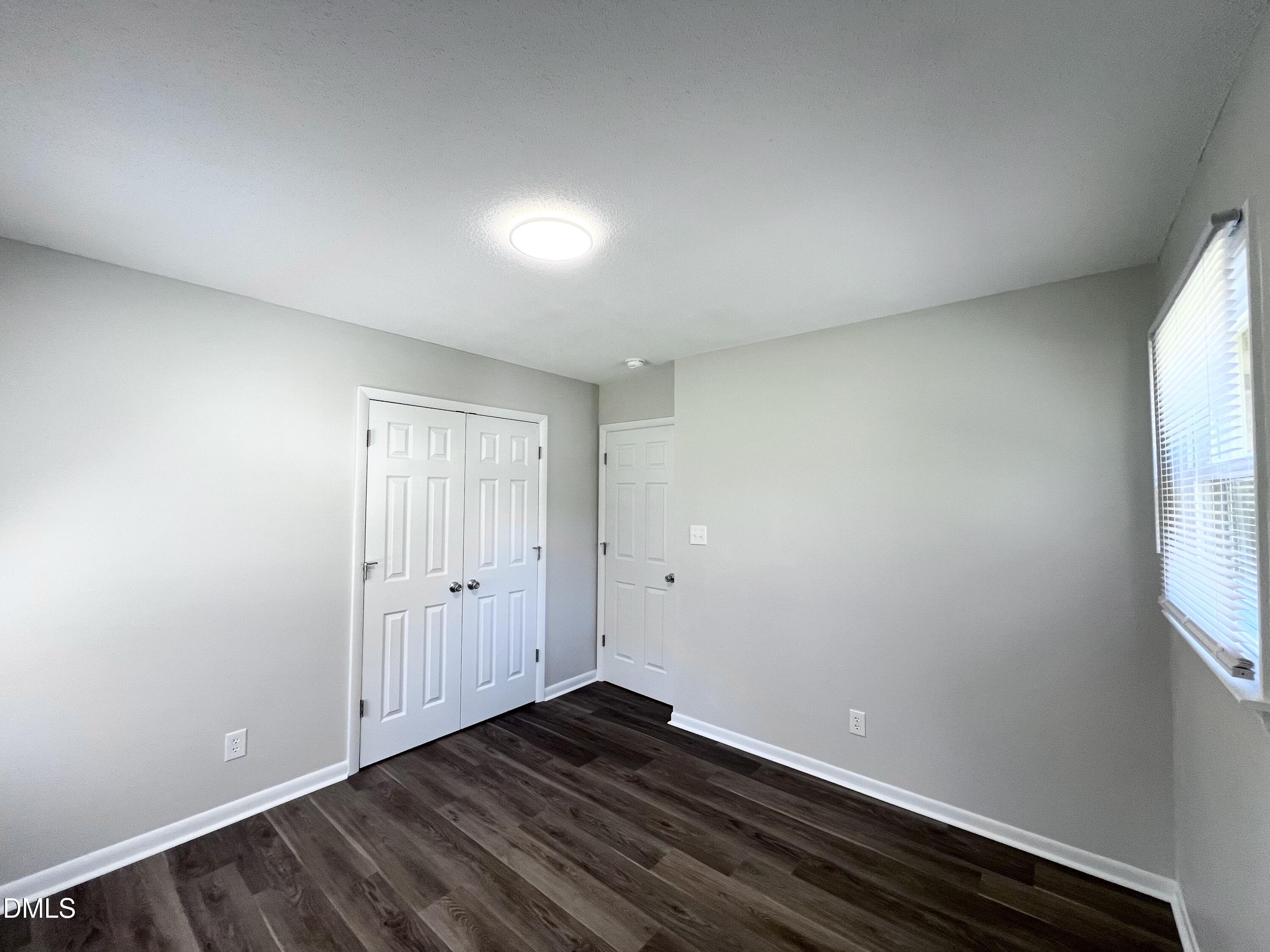 200 Infinity Road Durham, NC 27712 - Photo 23 of 32 a view of an empty room and window
