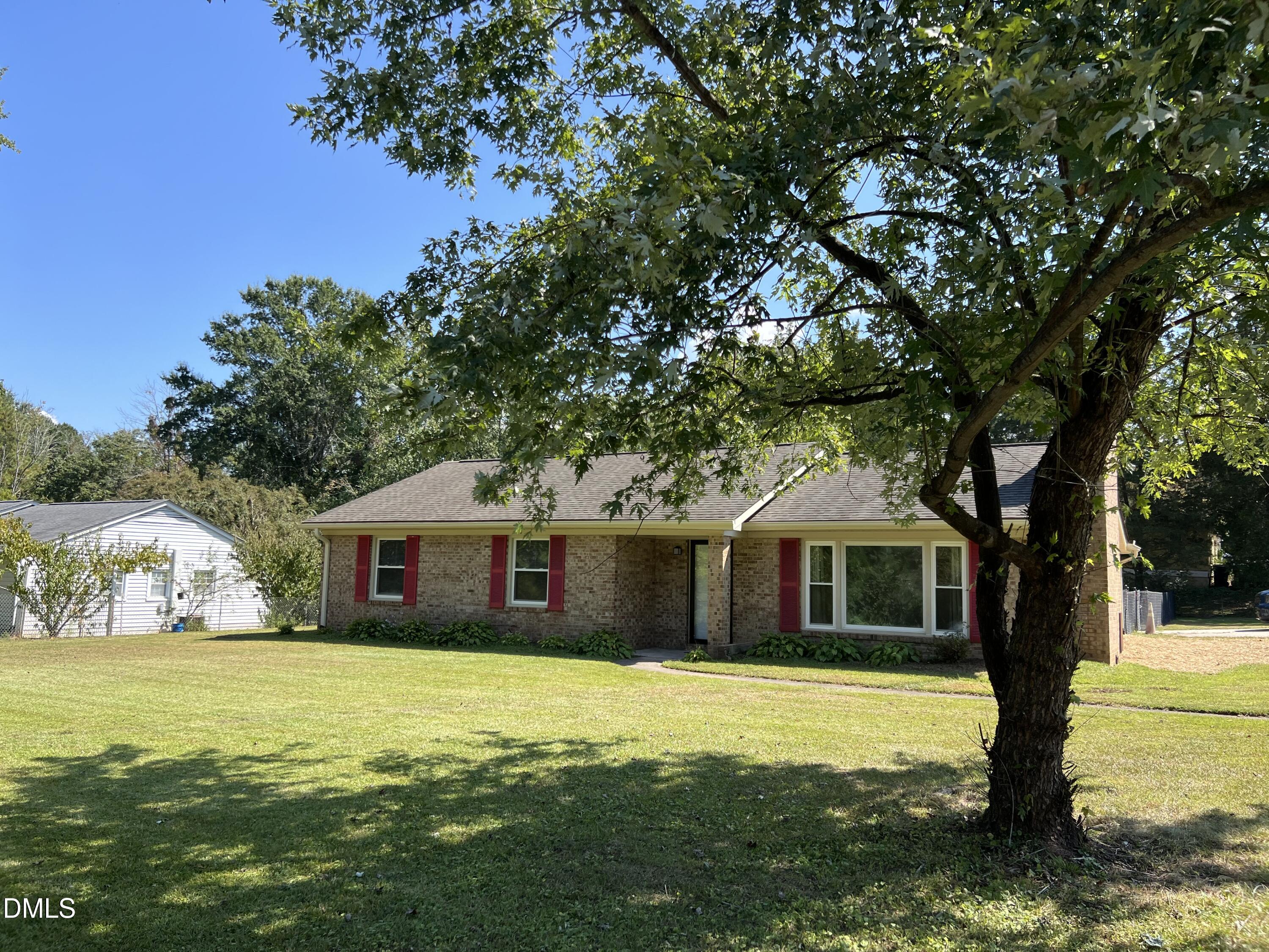 200 Infinity Road Durham, NC 27712 - Photo 3 of 32 a front view of a house with swimming pool
