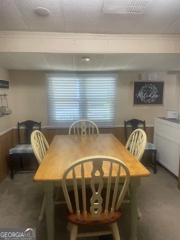 a bathroom with a shower and a toilet