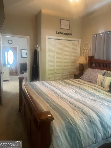 a view of a swimming pool with a table and chairs