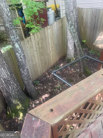 a view of balcony with wooden floor