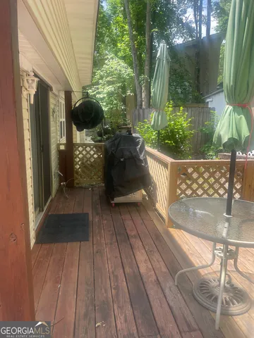 a view of a yard next to a lake