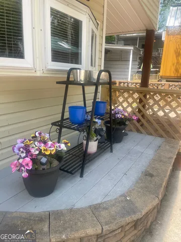 a front view of a house with patio