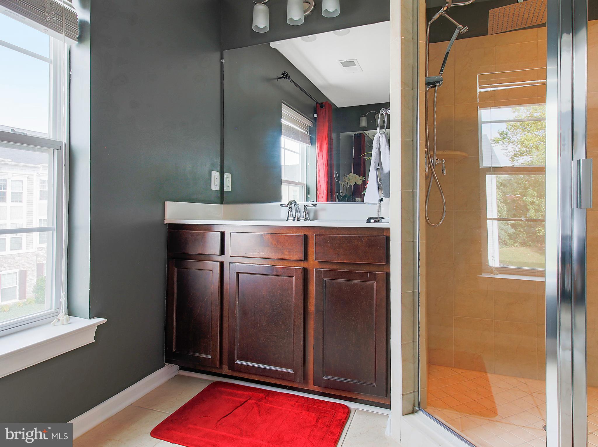 7465 Riding Meadow Way, Unit 42 Manassas, VA 20111 - Photo 19 of 26 a room with pool table and windows
