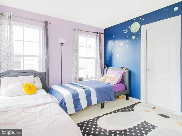 a bed room with a bed and a couch