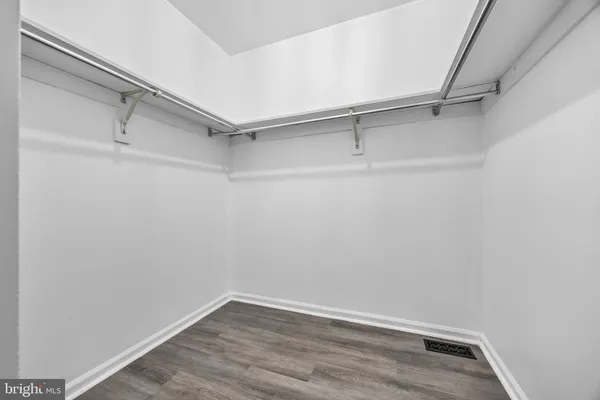 a view of an empty walk in closet