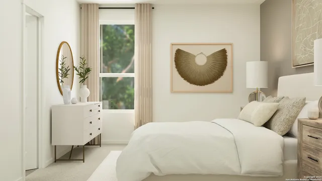 a bedroom with a bed a mirror and a window