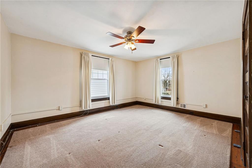618 State Street Greensburg, PA 15601 - Photo 24 of 34 an empty room with windows and fan