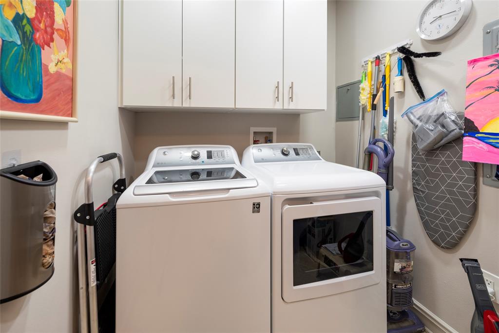 16102 Emerald Estates Drive, Unit 207 Weston, FL 33331 - Photo 17 of 32 a utility room with dryer and washer