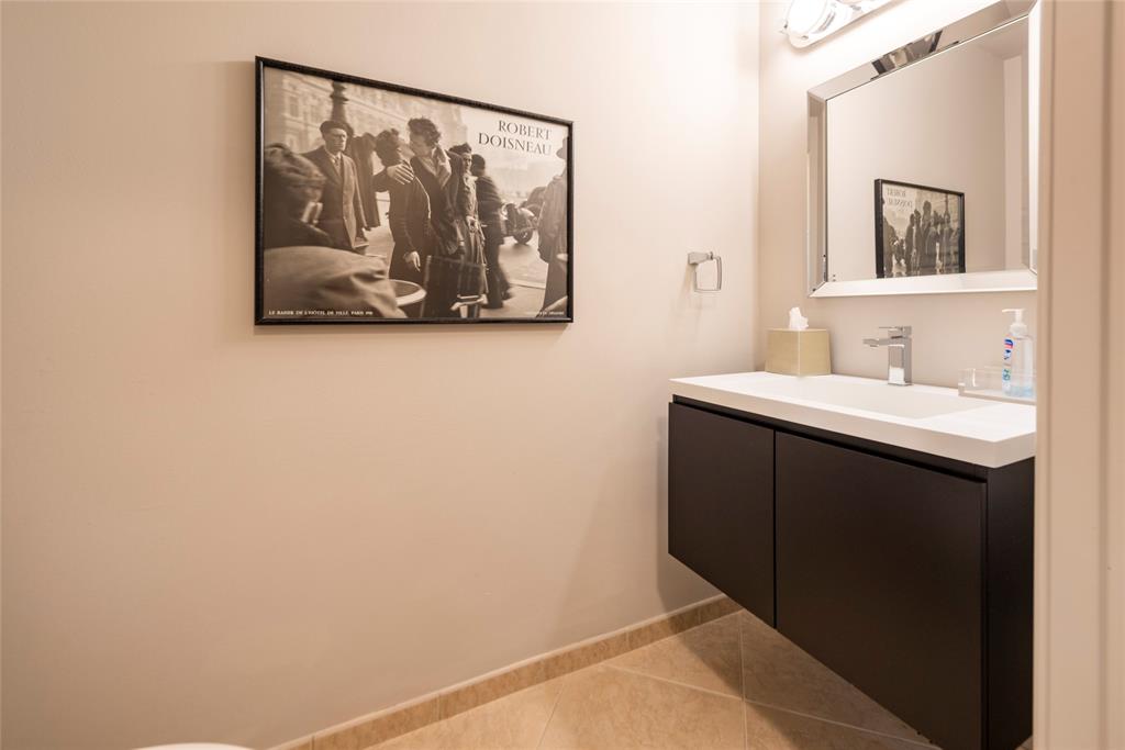 16102 Emerald Estates Drive, Unit 207 Weston, FL 33331 - Photo 18 of 32 a bathroom with a sink and a mirror