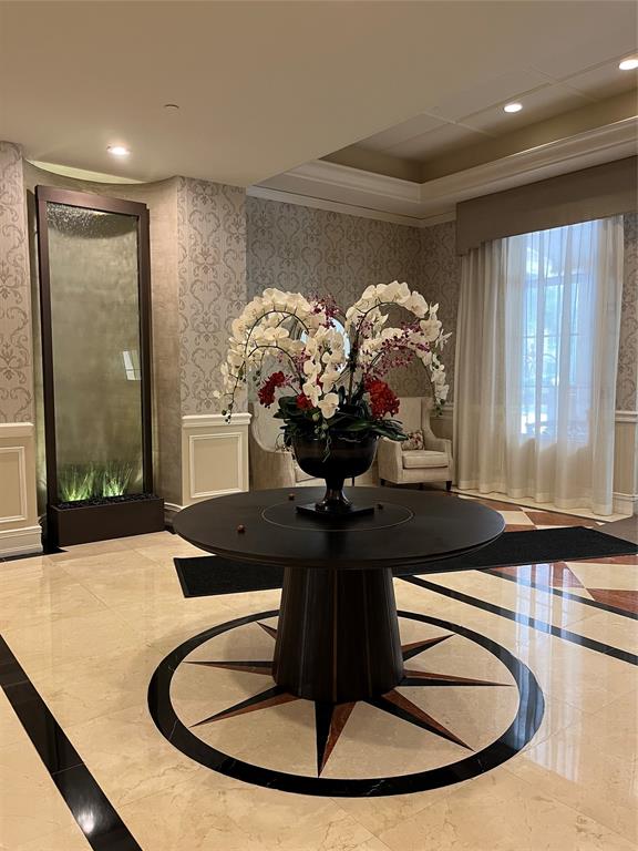 16102 Emerald Estates Drive, Unit 207 Weston, FL 33331 - Photo 22 of 32 a vase of flowers sitting on a table