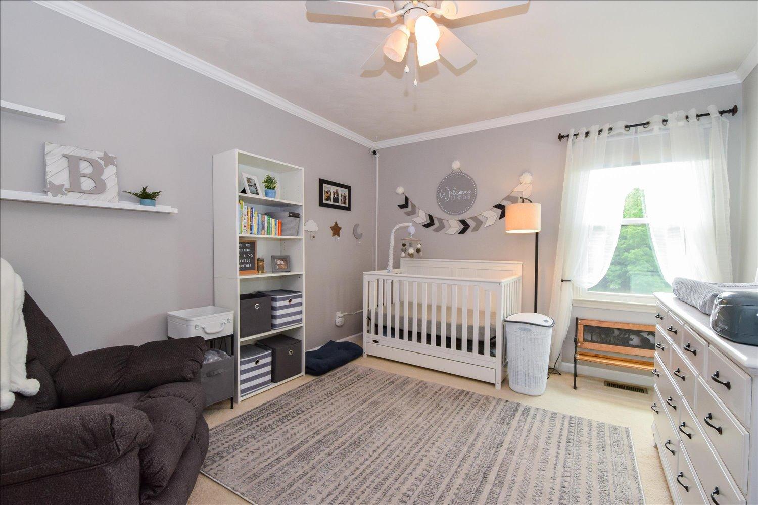 1535 Mountain View Road Vinton, VA 24179 - Photo 10 of 20 a bedroom with furniture and a wooden floor