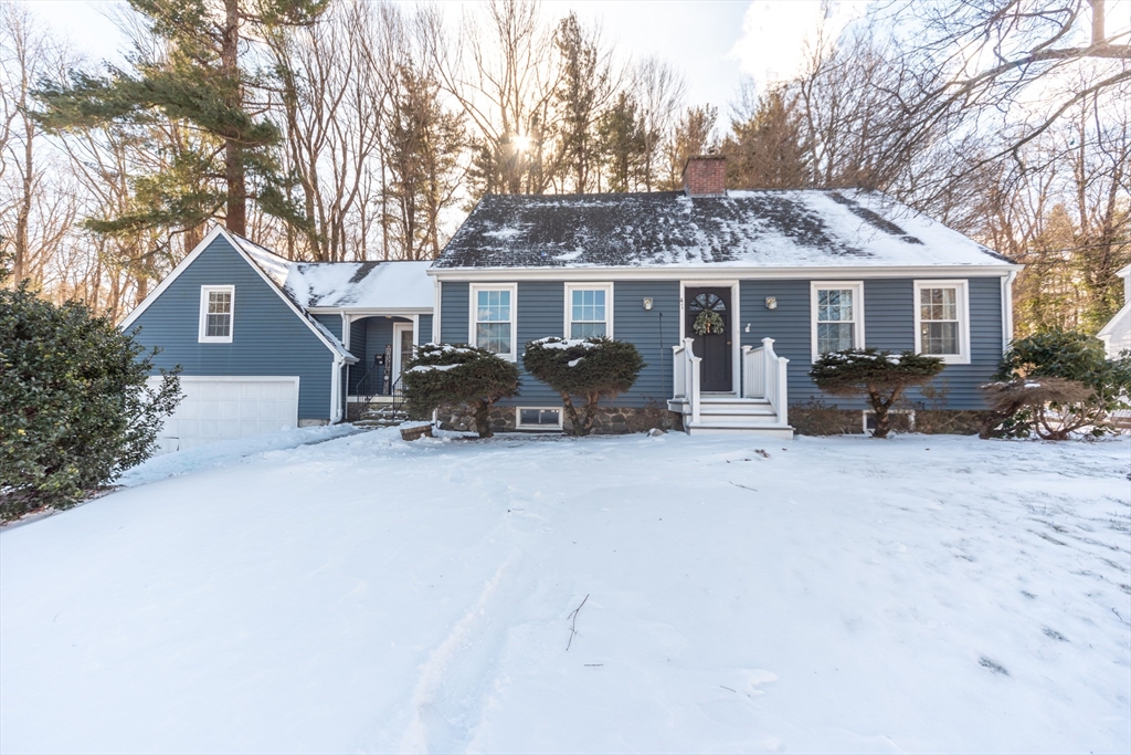 a front view of house with yard outdoor seating and barbeque oven