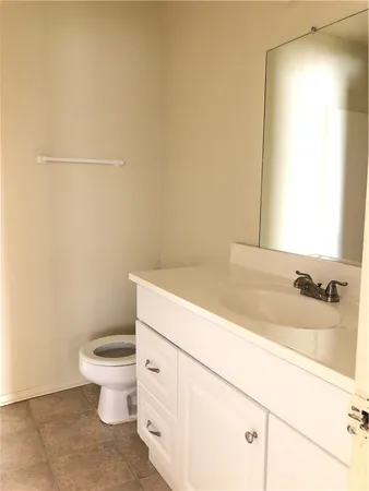 a bathroom with a sink and a toilet