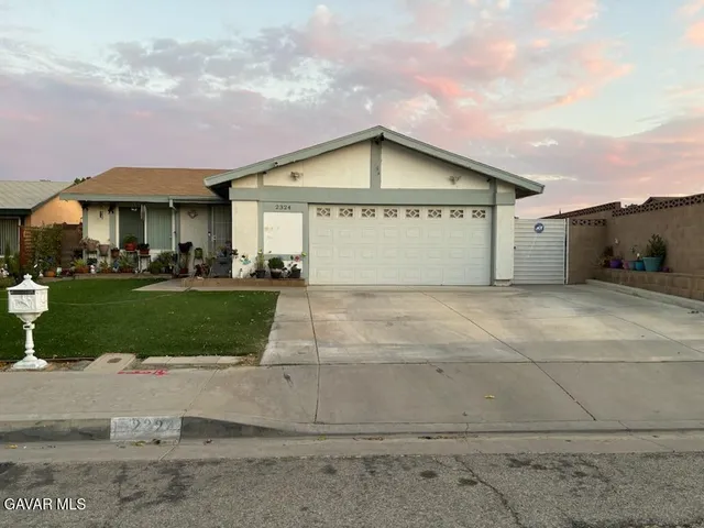 a view of building and yard