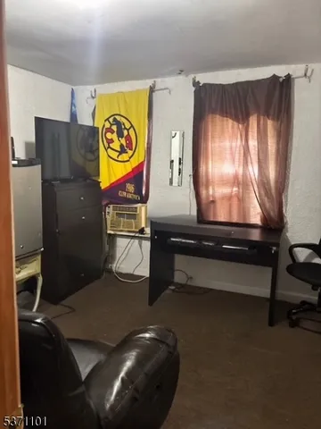 a kitchen with granite countertop a stove and a sink