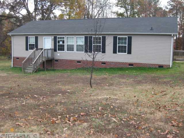 454 Rock Quarry Road Pelham, NC 27311 - Photo 1 of 9 Exterior Front.