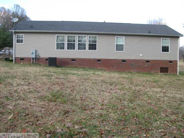 454 Rock Quarry Road Pelham, NC 27311 - Photo 2 of 9 Exterior Back.