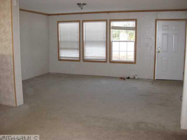 454 Rock Quarry Road Pelham, NC 27311 - Photo 3 of 9 Living Room.