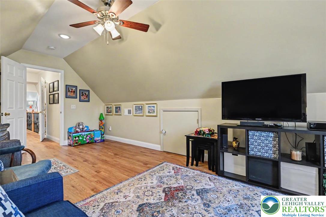 112 Michaels Run Road Stroudsburg, PA 18360 - Photo 50 of 69 This versatile living area boasts sloped ceilings and durable wood flooring.