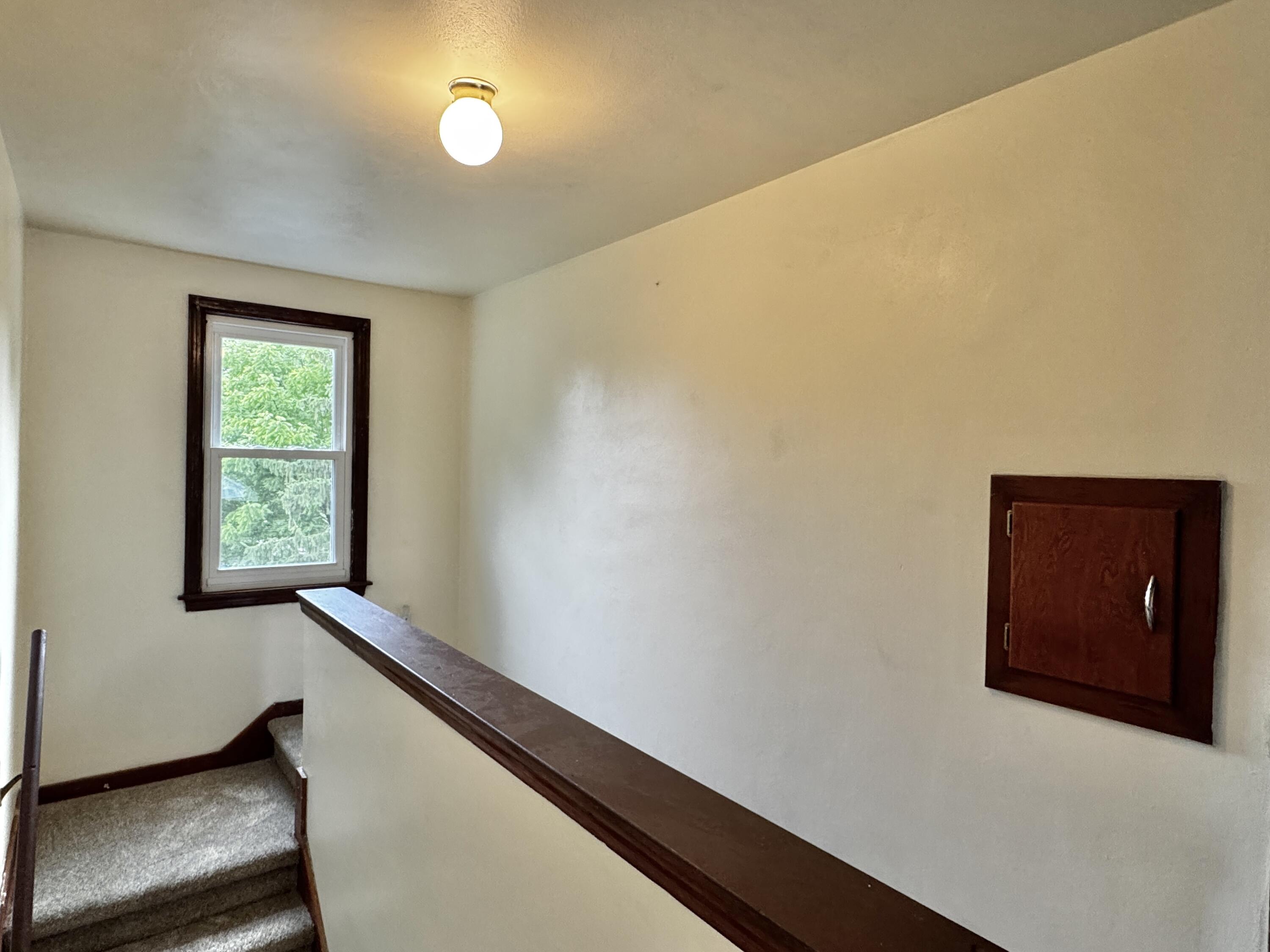 536 West Racine Street Jefferson, WI 53549 - Photo 12 of 18 Hallway upstairs with Laundry shute