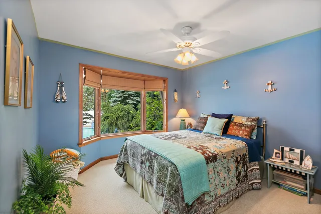 a bathroom with a sink toilet and mirror