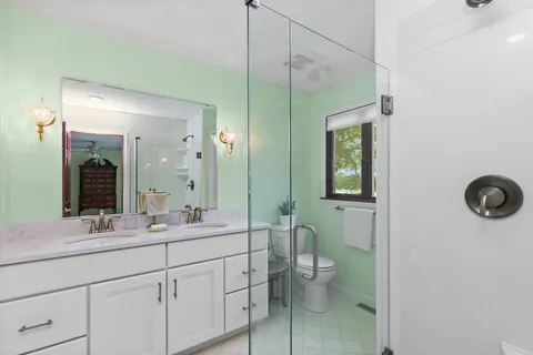 a view of swimming pool with a yard and seating area