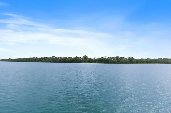 an aerial view of houses with yard