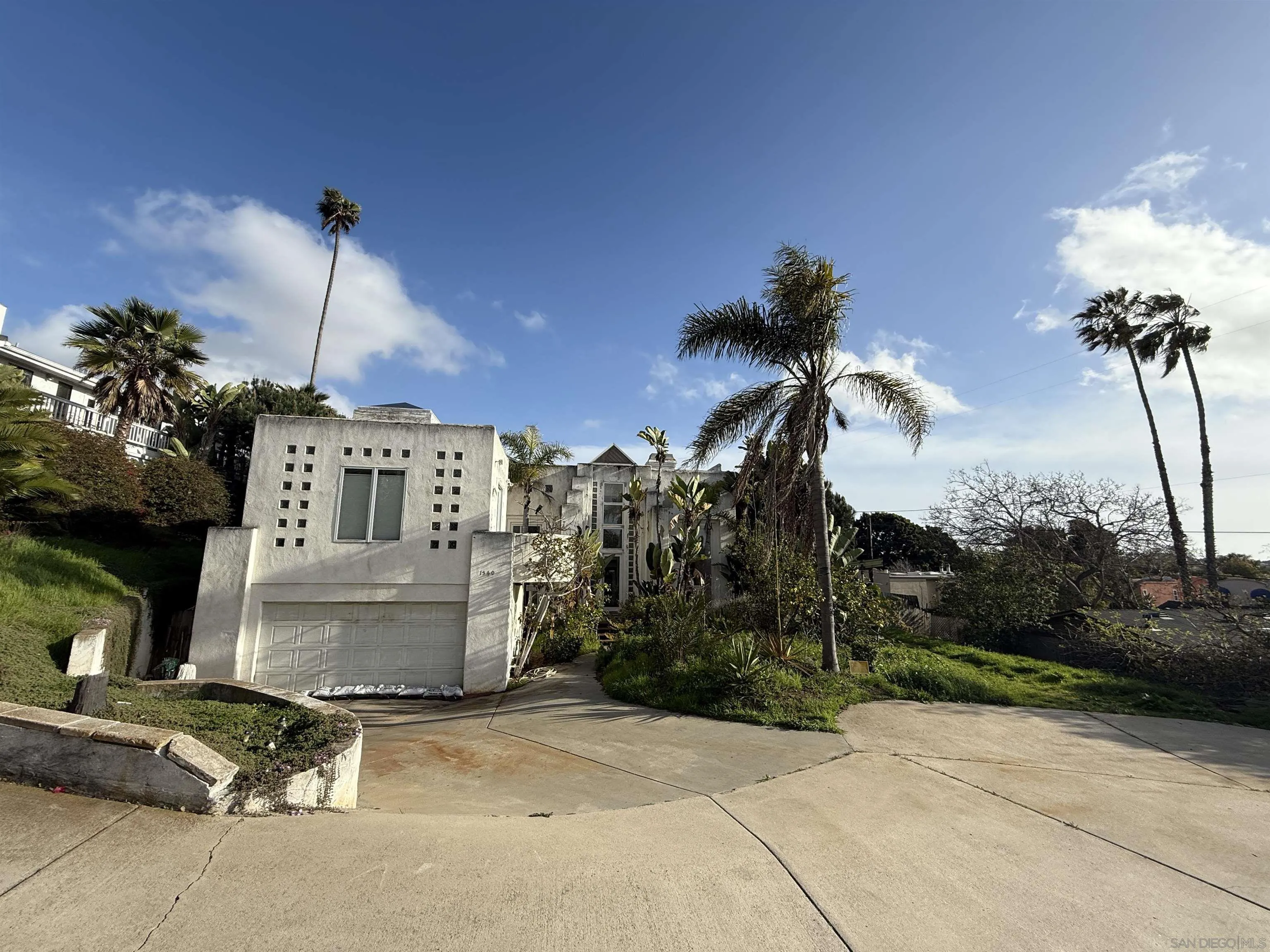 1540 Surf Road Encinitas, CA 92024 - Photo 1 of 2 a view of backyard of a house and potted plants