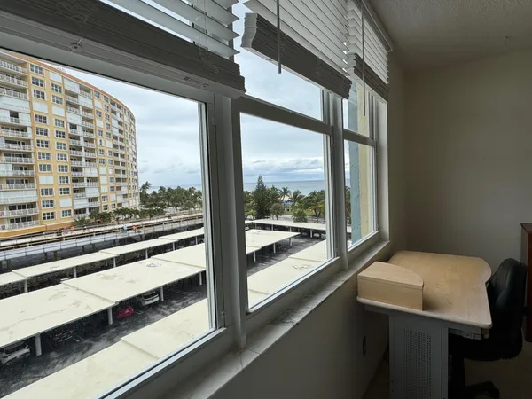 a view of a large room with a large window