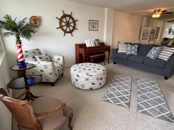 a living room with furniture and decor