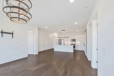 a view of a kitchen and a window