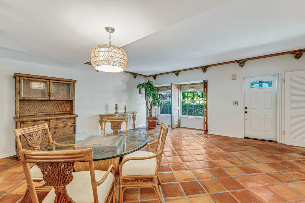 6590 North Ocean Boulevard, Unit 3 Ocean Ridge, FL 33435 - Photo 13 of 48 a view of a livingroom with furniture window and wooden floor