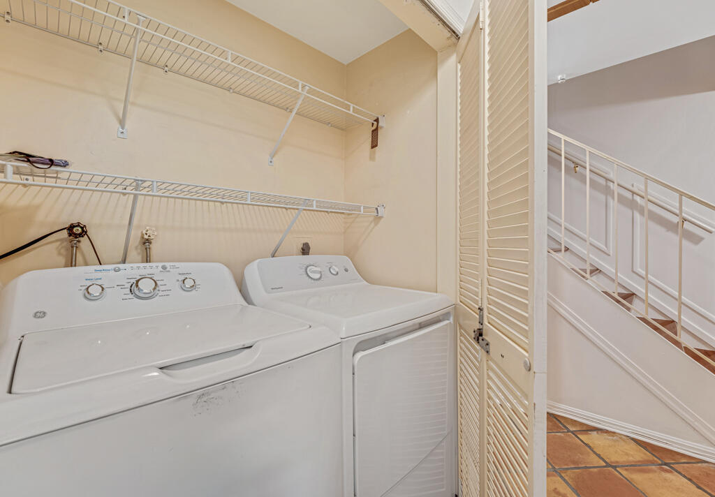 6590 North Ocean Boulevard, Unit 3 Ocean Ridge, FL 33435 - Photo 29 of 48 a utility room with dryer and washer