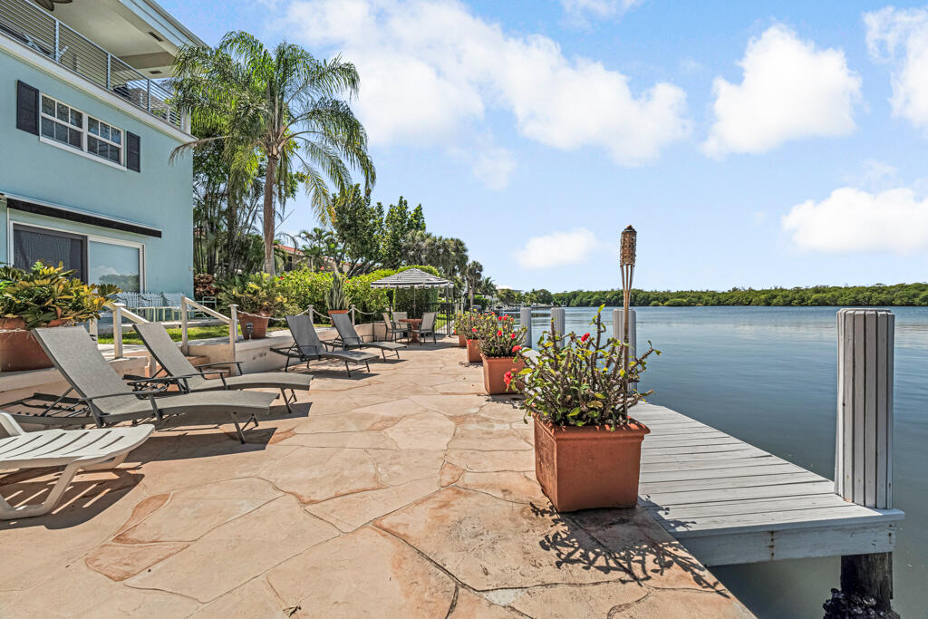 6590 North Ocean Boulevard, Unit 3 Ocean Ridge, FL 33435 - Photo 32 of 48 a view of a terrace with chairs