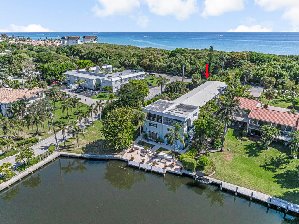 6590 North Ocean Boulevard, Unit 3 Ocean Ridge, FL 33435 - Photo 39 of 48 an aerial view of house with yard swimming pool and outdoor seating