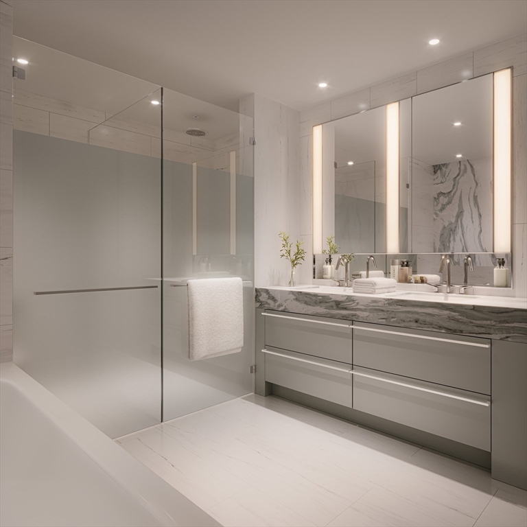 682 Atlantic Avenue, Unit 40G Boston, MA 02111 - Photo 3 of 13 a bathroom with a shower sink and mirror