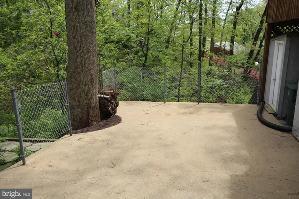 a view of backyard with green space