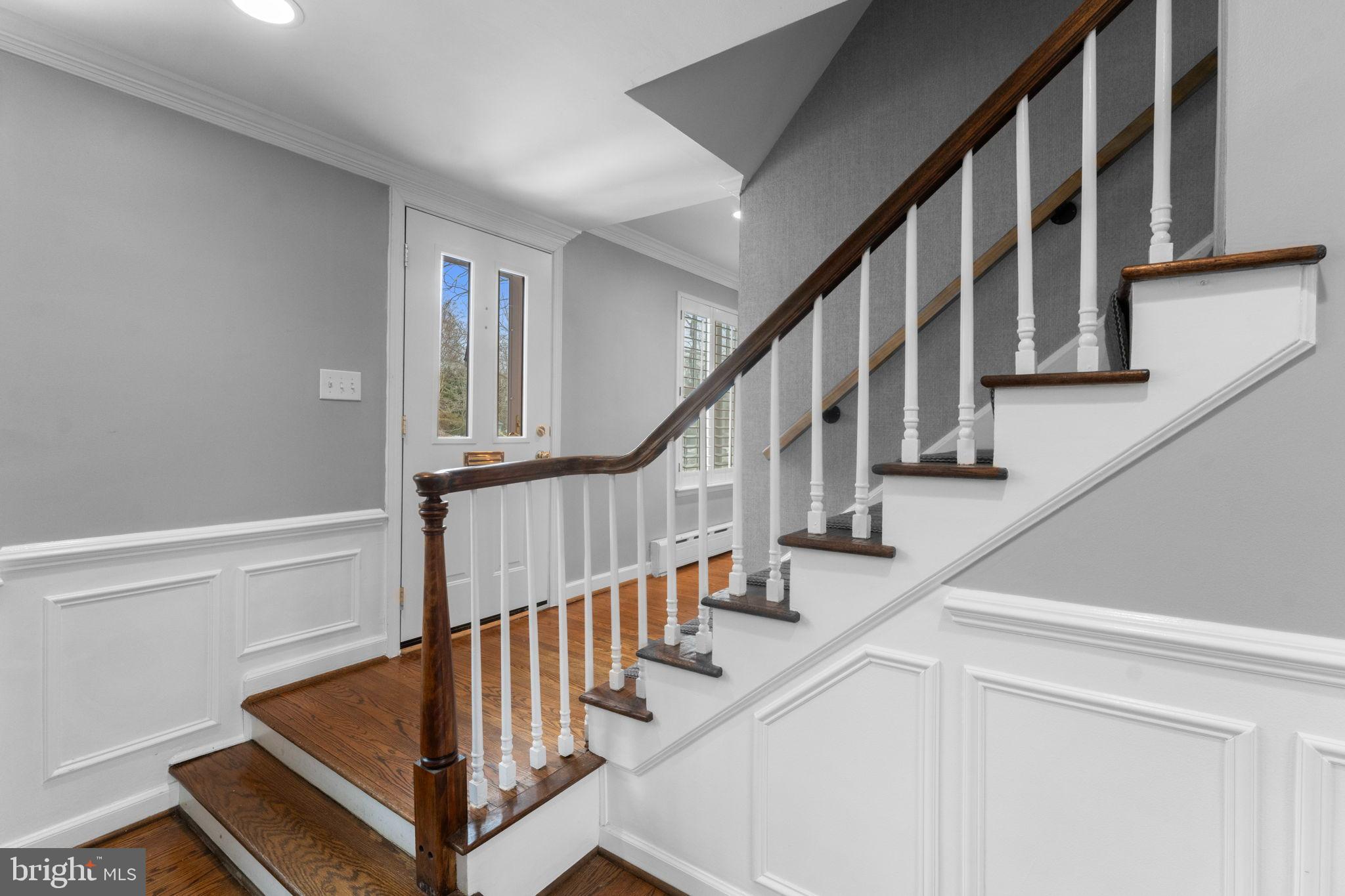 3207 Circle Hill Road Alexandria, VA 22305 - Photo 27 of 51 Elegant staircase in a welcoming entryway.