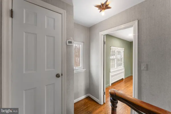 a view of an empty room with a cabinet