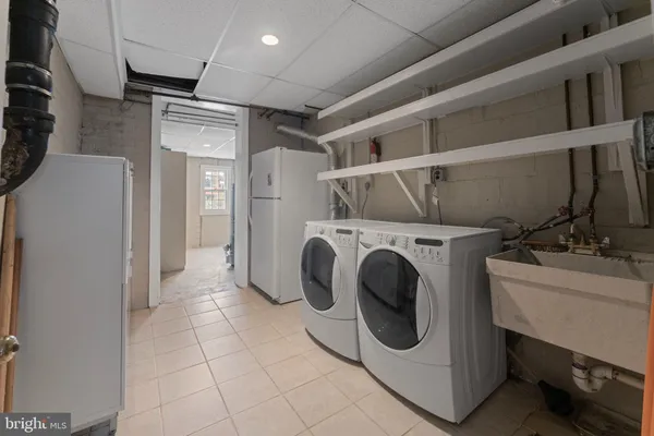 a view of a livingroom with storage & utility room