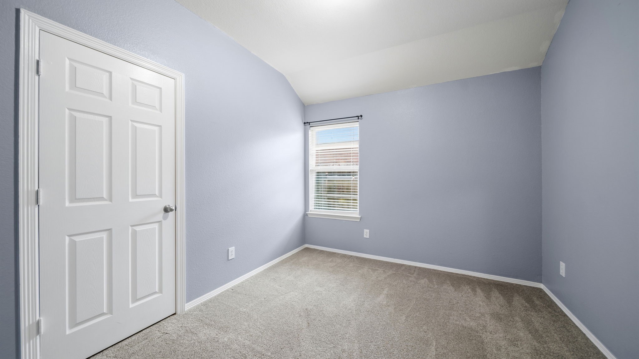 213 Mesa View Conroe, TX 77316 - Photo 13 of 19 an empty room with windows