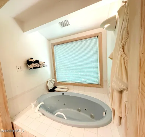 a bathroom with a tub