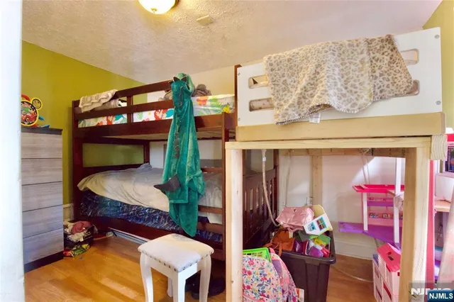 a balcony filled with furniture and furniture