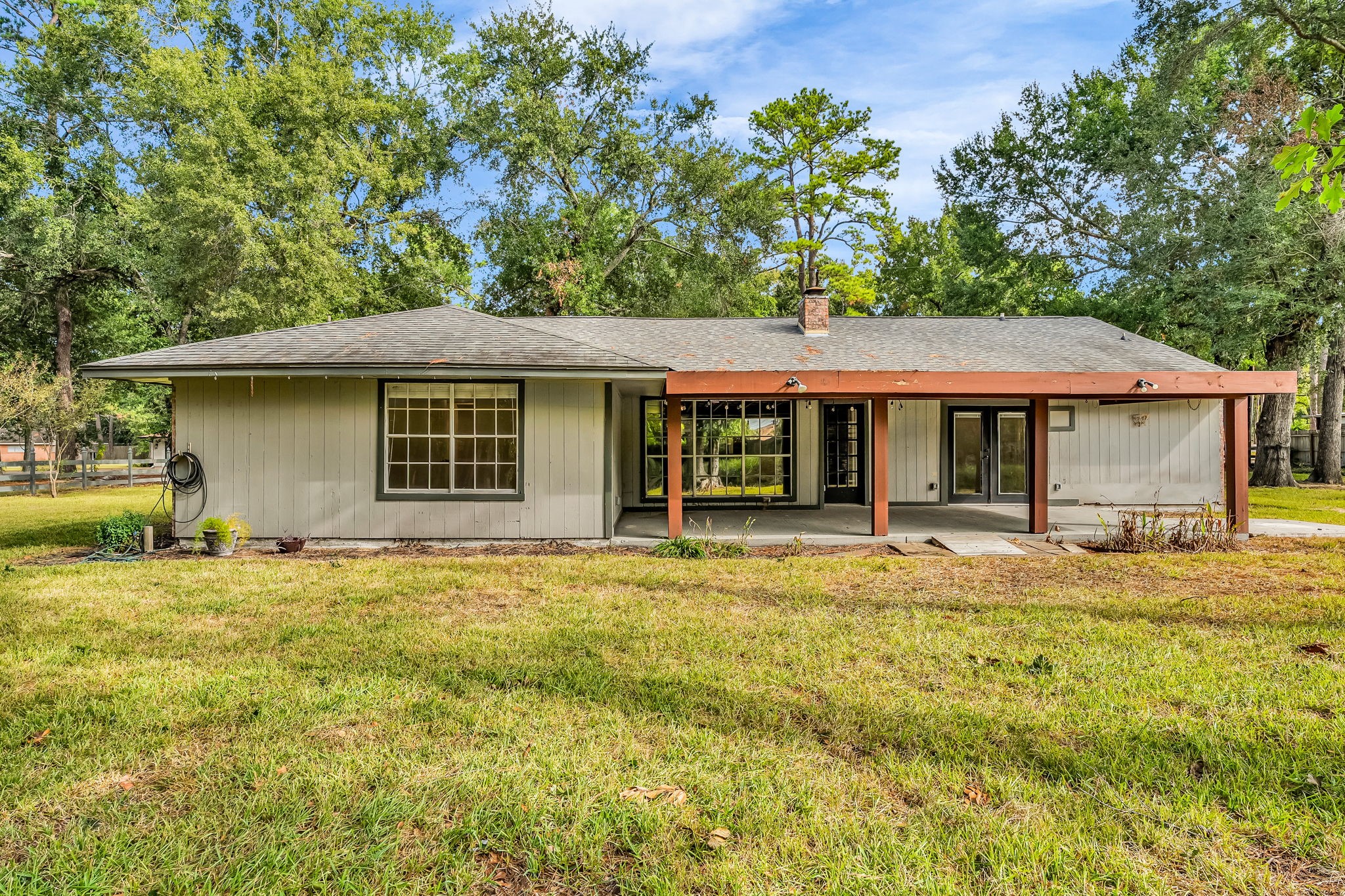 19811 Sagging Oaks Drive Spring, TX 77388 - Photo 30 of 36 a front view of a house with a garden