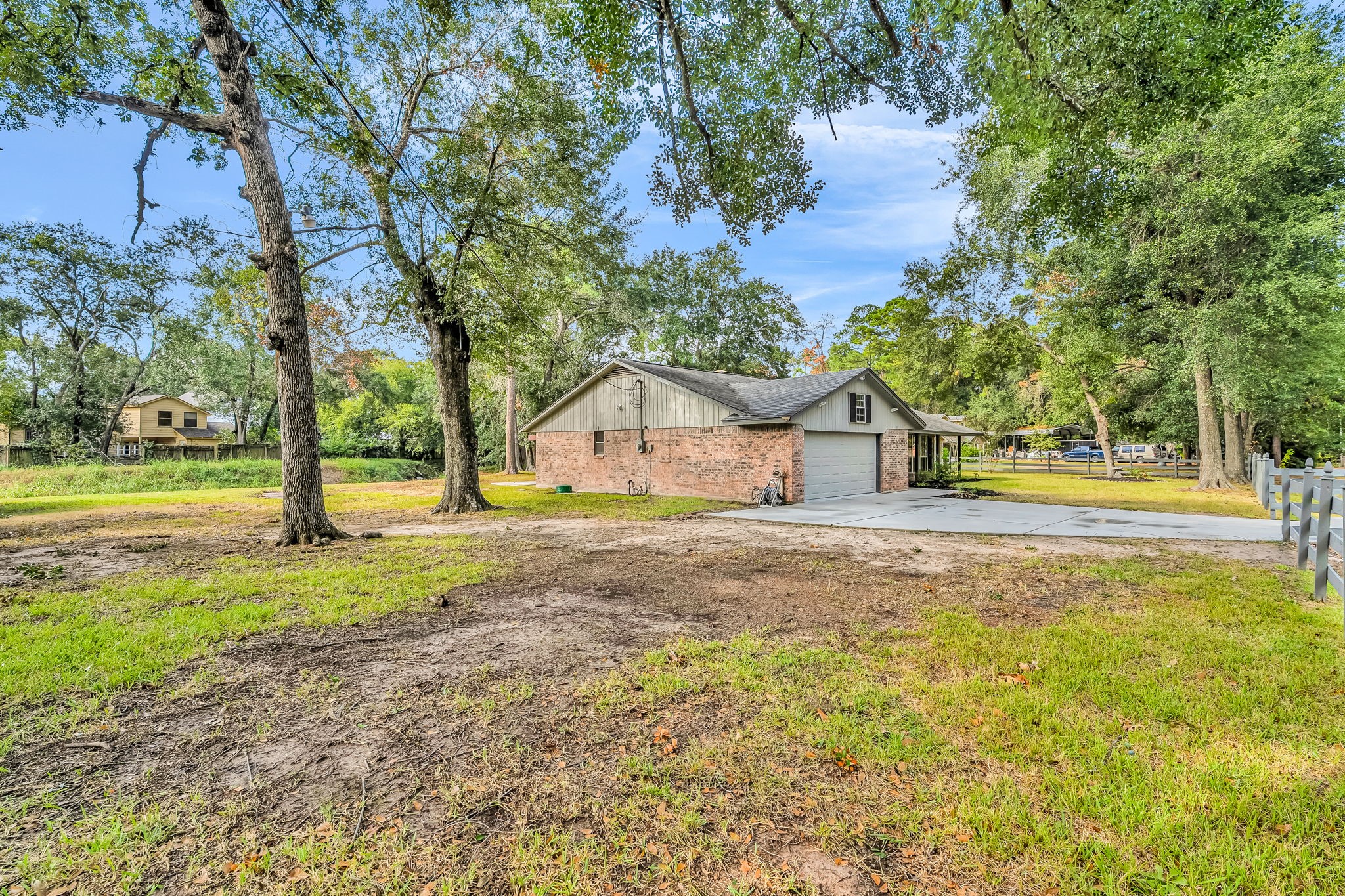 19811 Sagging Oaks Drive Spring, TX 77388 - Photo 35 of 36 a house with trees in front of it