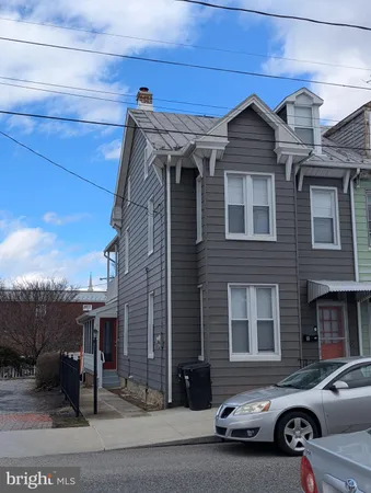 a car parked in front of a building